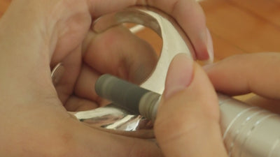 Video about making and polishing jewelry, silver bracelet in the making